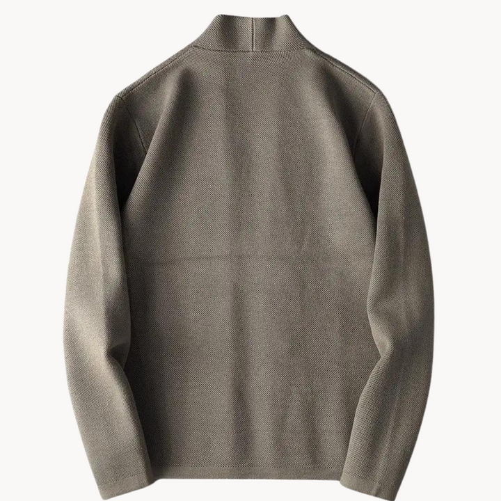 Close-up of a men's versatile knitwear cardigan, showing button-up detail and comfortable texture.
