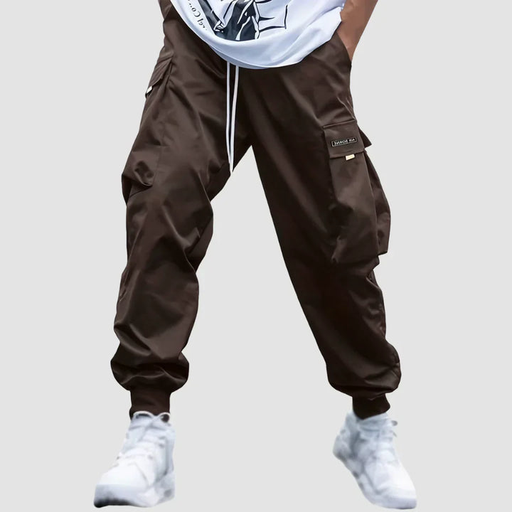 Khaki men's utility cargo pants, durable and comfortable for everyday use & outdoor activities.