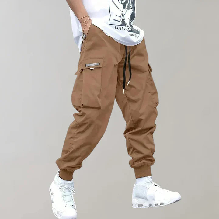 Versatile gray men's cargo pants, combining comfort, function, and modern men's fashion.