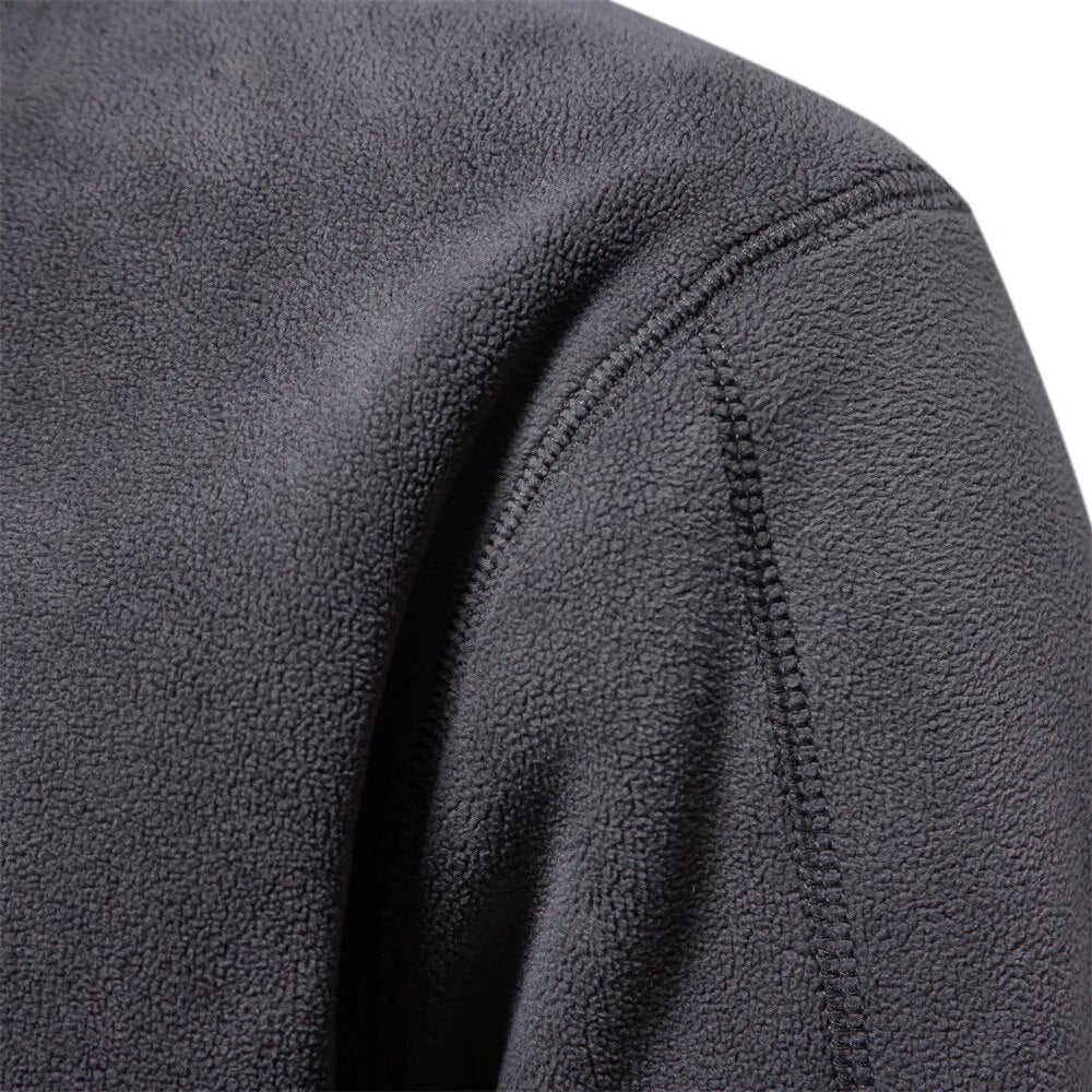 Comfortable men's half-zip long sleeve pullover sweater, great for layering and everyday casual style.