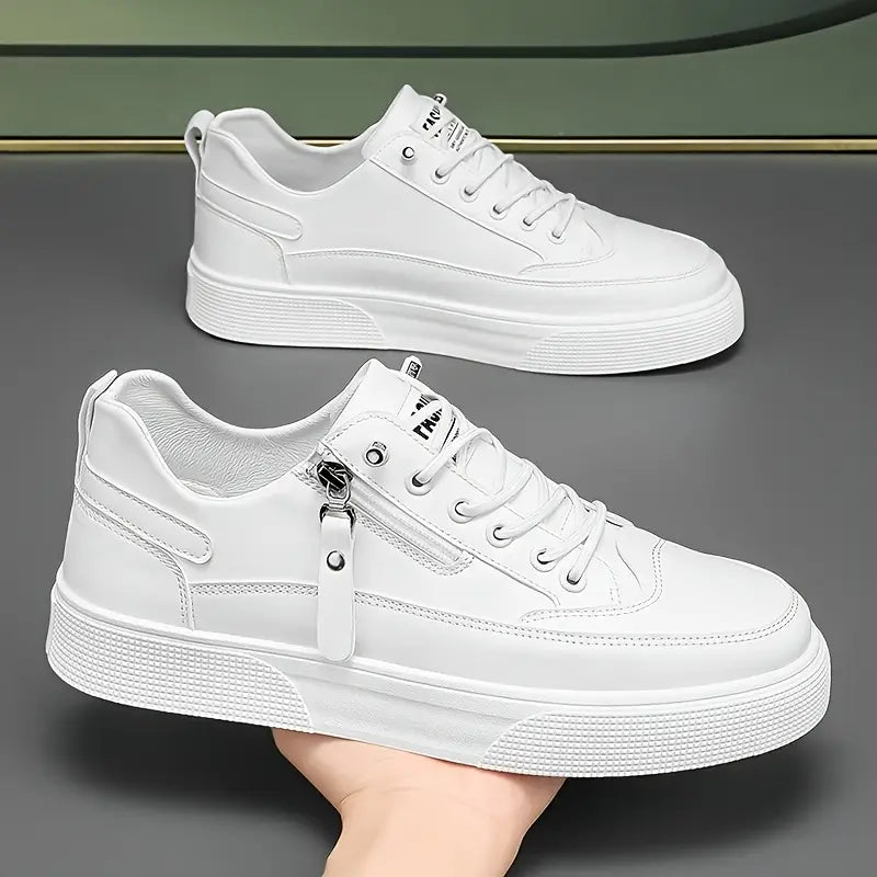 White men's Hudson sneakers with practical side zip closure, ideal for travel & everyday casual wear.