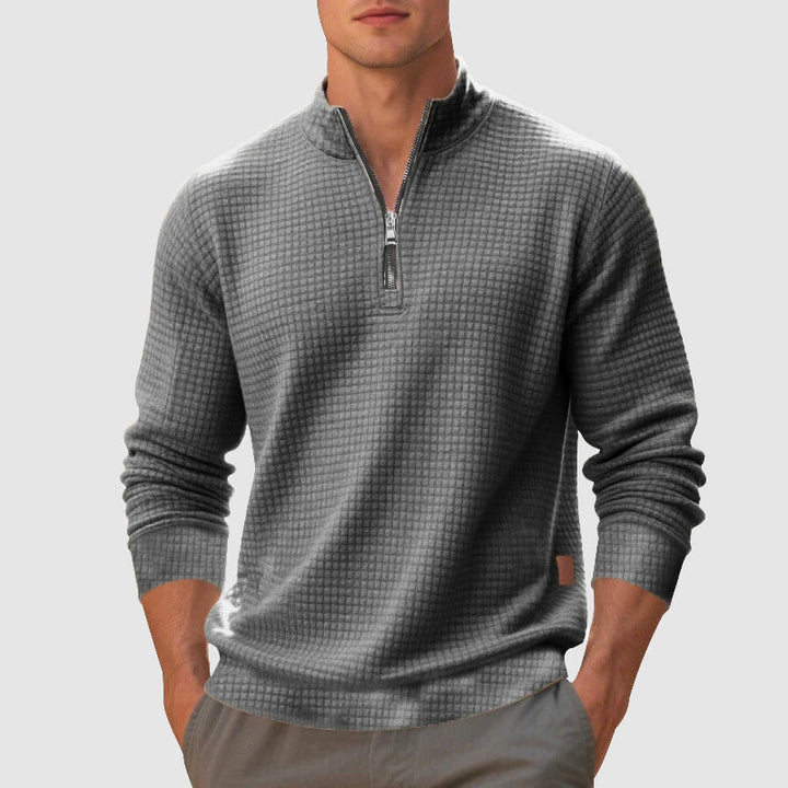 Men's stylish quarter-zip jumper with stand collar, perfect for fall fashion. Versatile textured knit pullover.