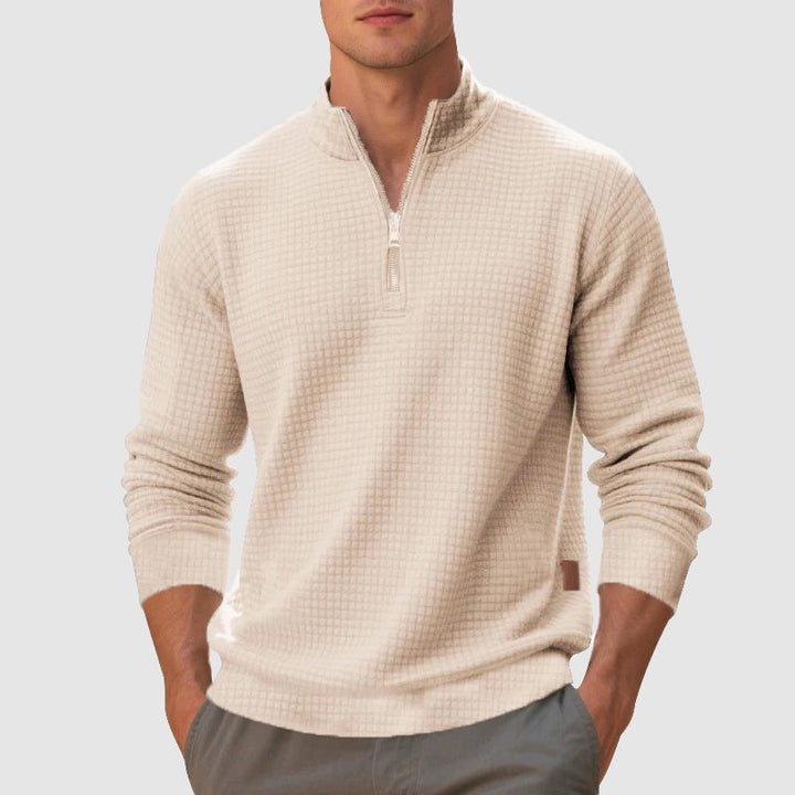 Casual men's quarter-zip sweater featuring a stylish stand collar. Comfortable fall & winter fashion pullover.