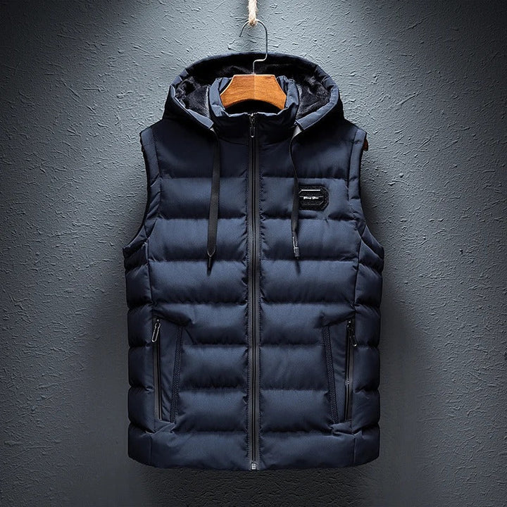 Sporty men's quilted vest with adjustable hood, offering comfort and warmth for everyday.