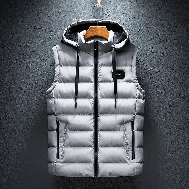 Versatile men's hooded quilted outerwear vest, great for casual style and extra warmth.