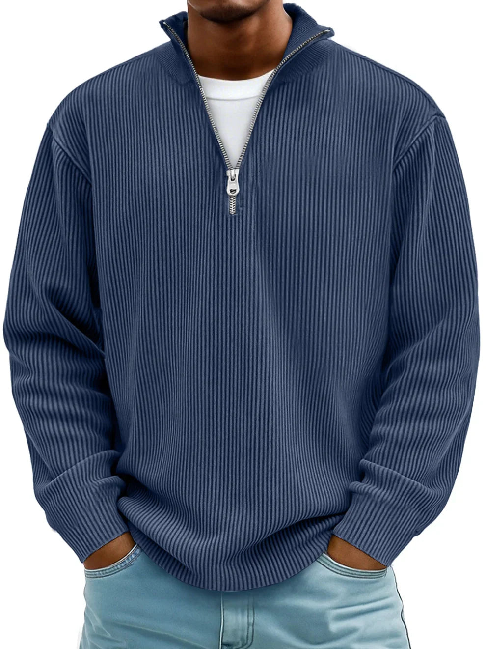 Folded men's long sleeve ribbed half-zip sweater, ready for layering in cooler weather.