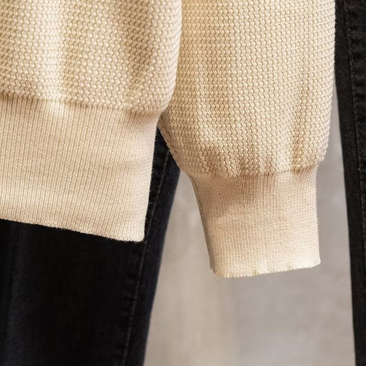 Versatile men's ribbed polo sweater, ideal for smart casual wear or comfortable everyday outfits.