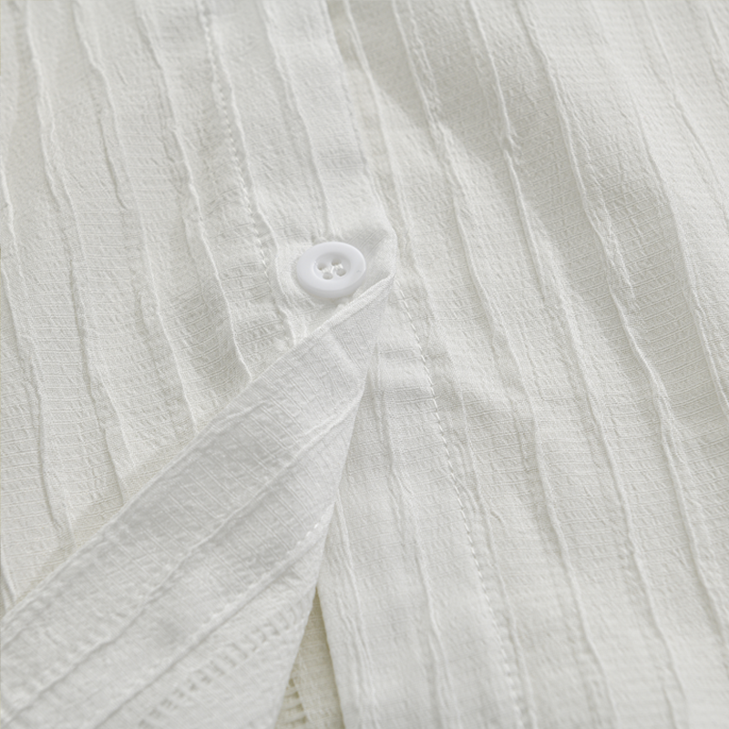 Modern men's stylish long sleeve ribbed shirt with button front, a versatile fashion piece.