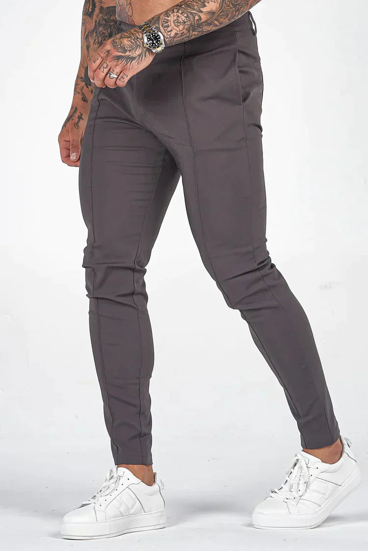 Casual men's slim fit chinos in beige, offering modern style and comfort for everyday wear.