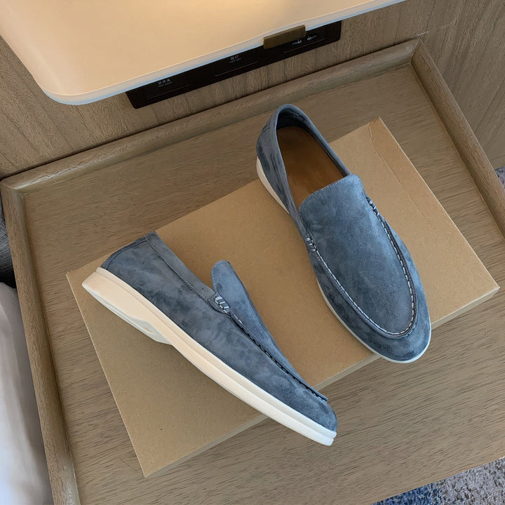 Stylish men's slip-on loafers. Lightweight, comfortable footwear perfect for both casual and formal settings.