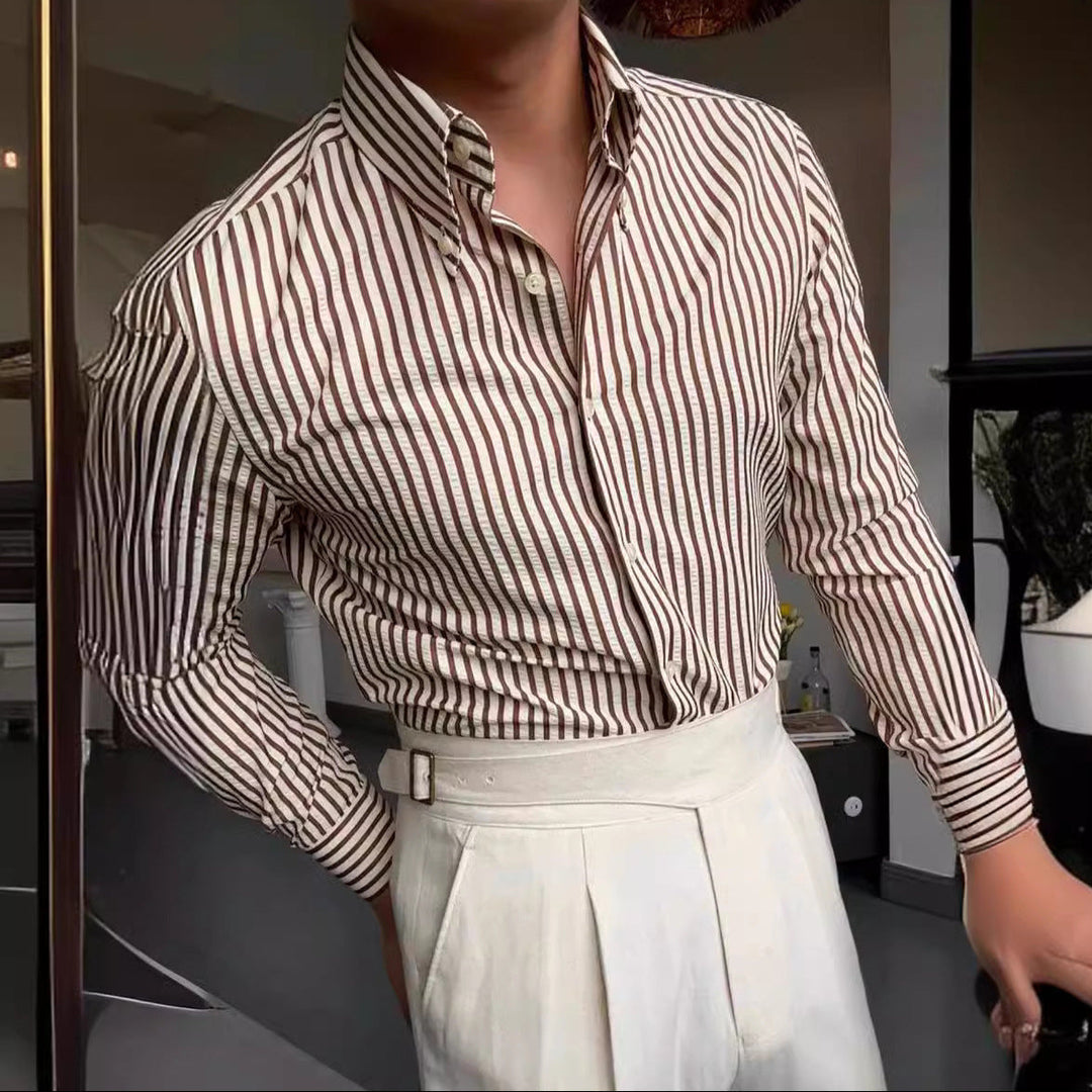 Versatile men's striped button-down long-sleeve shirt for casual or formal wear. A key men's fashion essential.