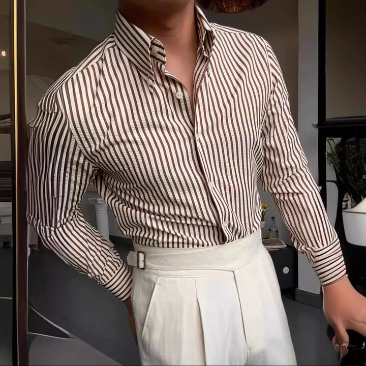 Versatile men's striped button-down long-sleeve shirt for casual or formal wear. A key men's fashion essential.