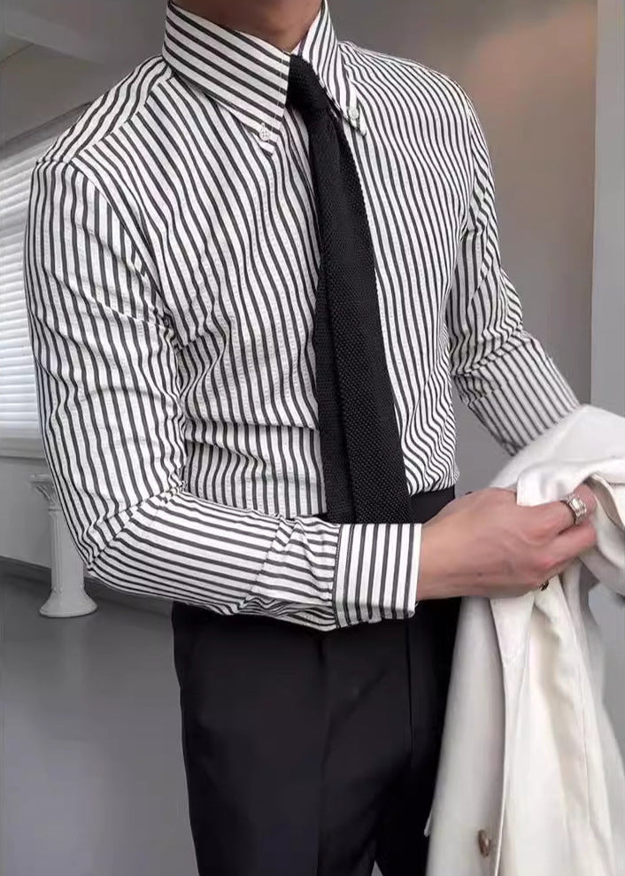 Elegant men's striped pattern dress shirt with button-down collar & long sleeves. Ideal for modern men's fashion.