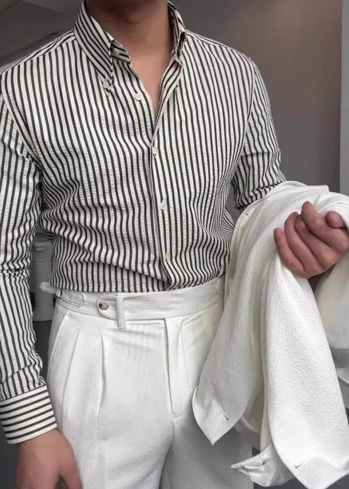 Classic men's long-sleeve striped button-down shirt. A stylish, comfortable wardrobe essential for any man.