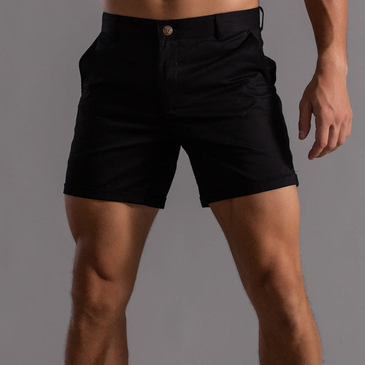Men's summer chino shorts, tailored for comfort & style, suitable for casual or smart-casual occasions.