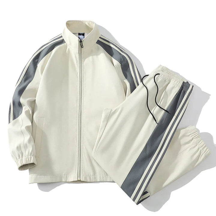 Men's stylish two-piece tracksuit featuring a full zip jacket and comfortable joggers, perfect for casual wear.