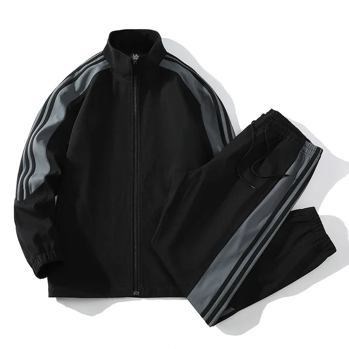 Fashionable men's streetwear tracksuit set, a two-piece with full zip top and jogger bottoms for daily style.