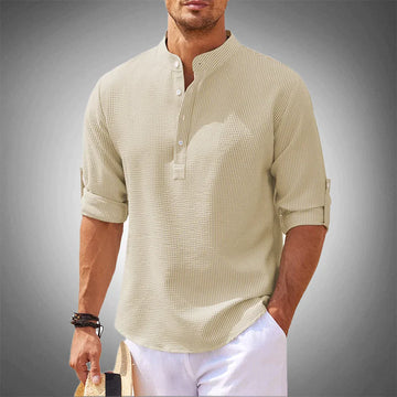Modern men's blue button-down shirt. Long sleeve, tailored fit for stylish casual spring & summer outfits.