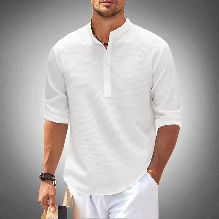 Versatile men's long sleeve button-down shirt in black. Modern tailored fit for casual spring and summer style.