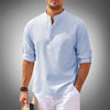 Full shot of a man wearing a stylish blue long sleeve button-down shirt. Modern tailored fit, spring fashion.