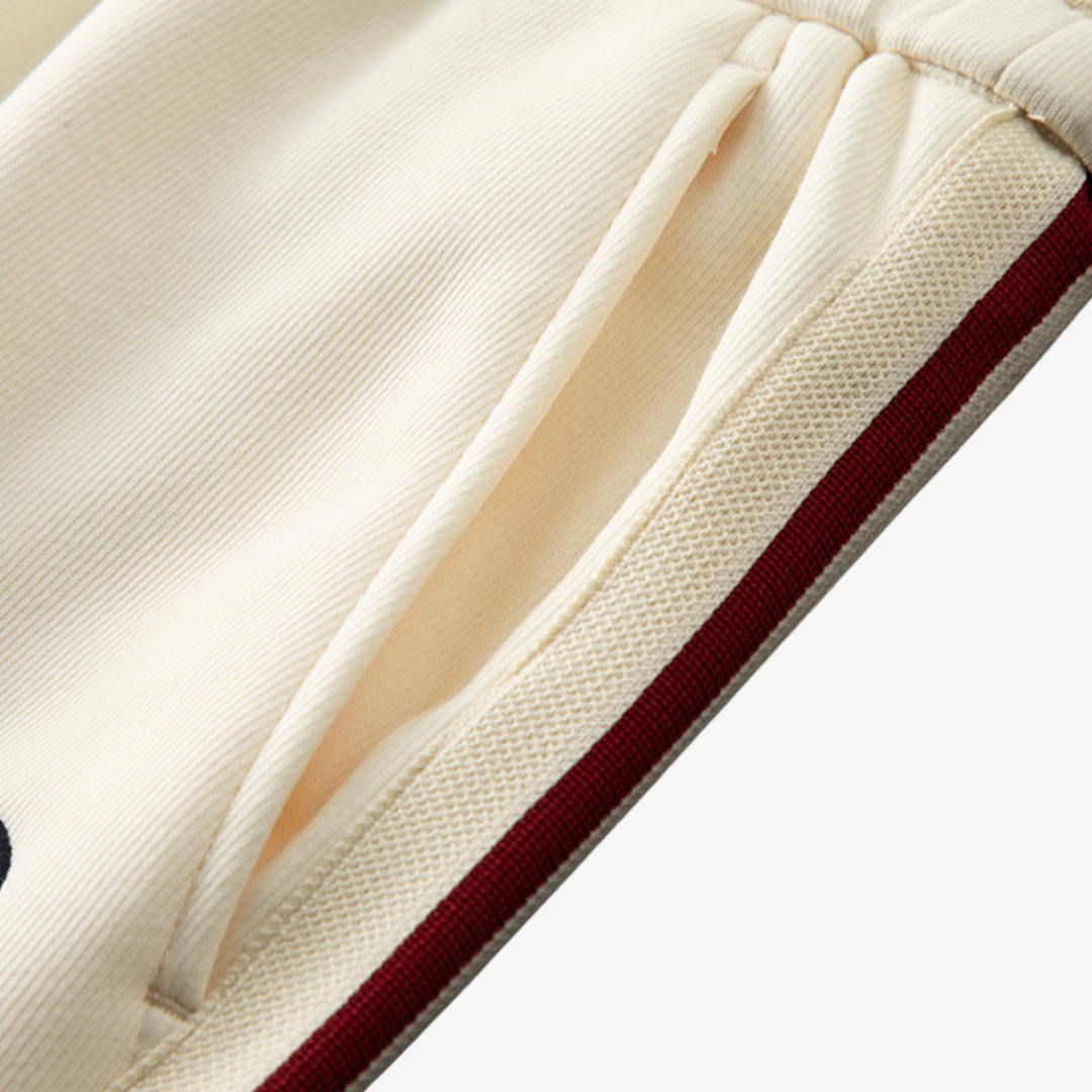 Ultra-comfortable men's loungewear tracksuit, featuring a cozy zip-up hoodie and relaxed fit joggers.