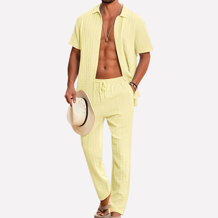 Men's casual summer co-ord set: textured shirt & relaxed trousers. Great for beach style or vacation.