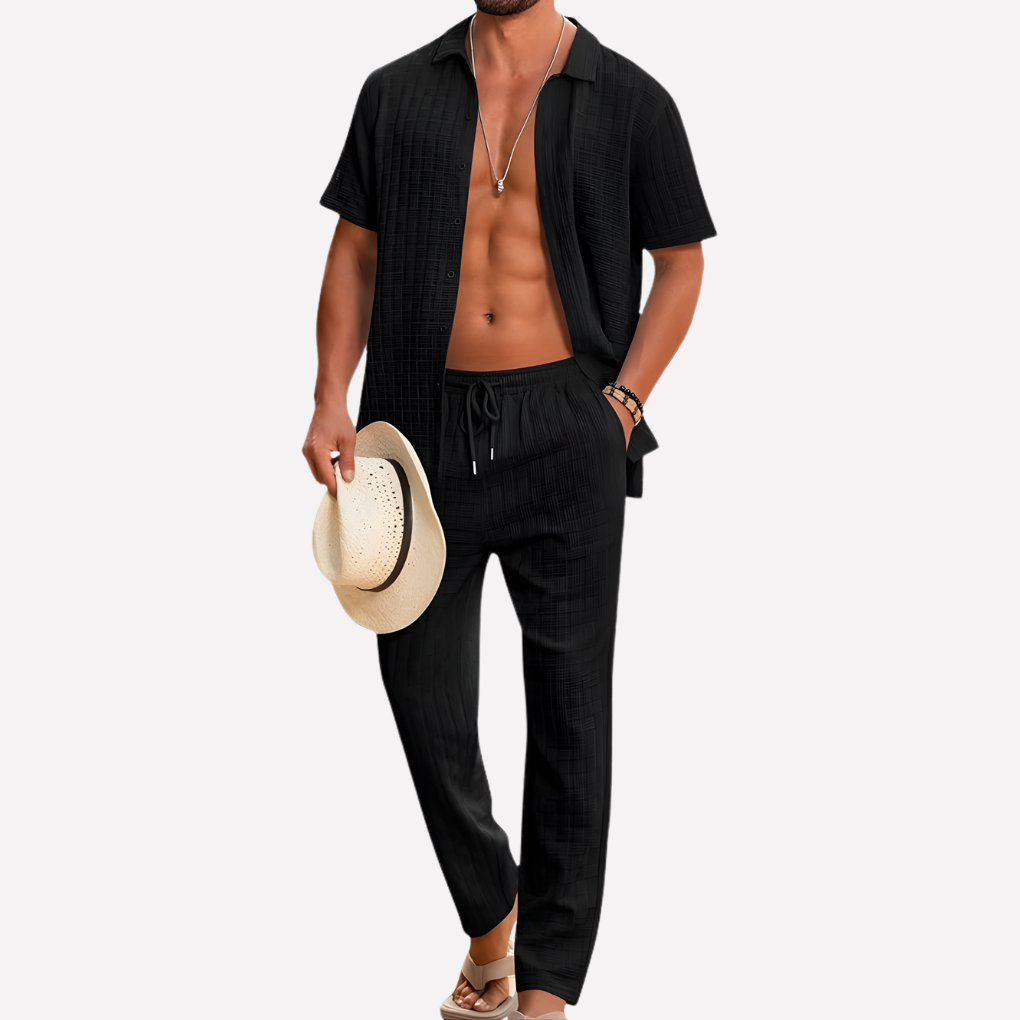 Men's casual summer co-ord set, styled for outdoors: textured shirt & relaxed fit trousers.