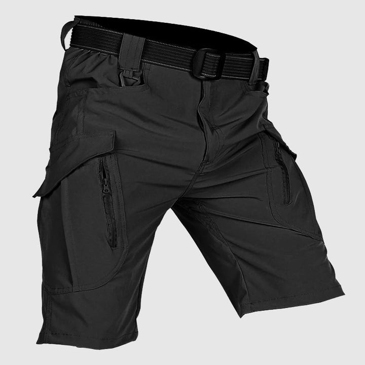 Relaxed fit men's cargo shorts, ideal for summer adventures. Tactical design & multiple utility pockets.