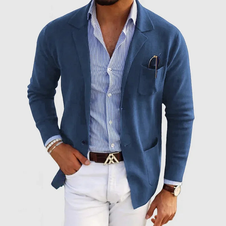 Stylish men's tailored blazer in a neutral shade, featuring practical casual flap pockets for a refined smart casual look.