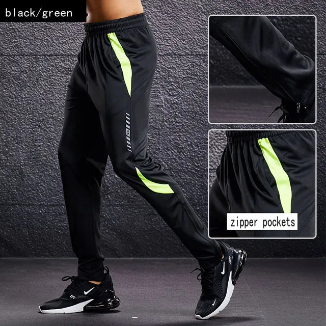 Close-up of men's grey tapered athletic joggers, highlighting practical zipper pockets for secure storage.