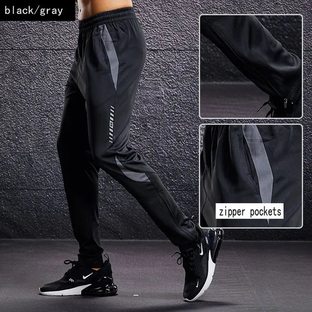 Man wearing grey tapered athletic jogger pants, perfect for training, running, or casual activewear fashion.