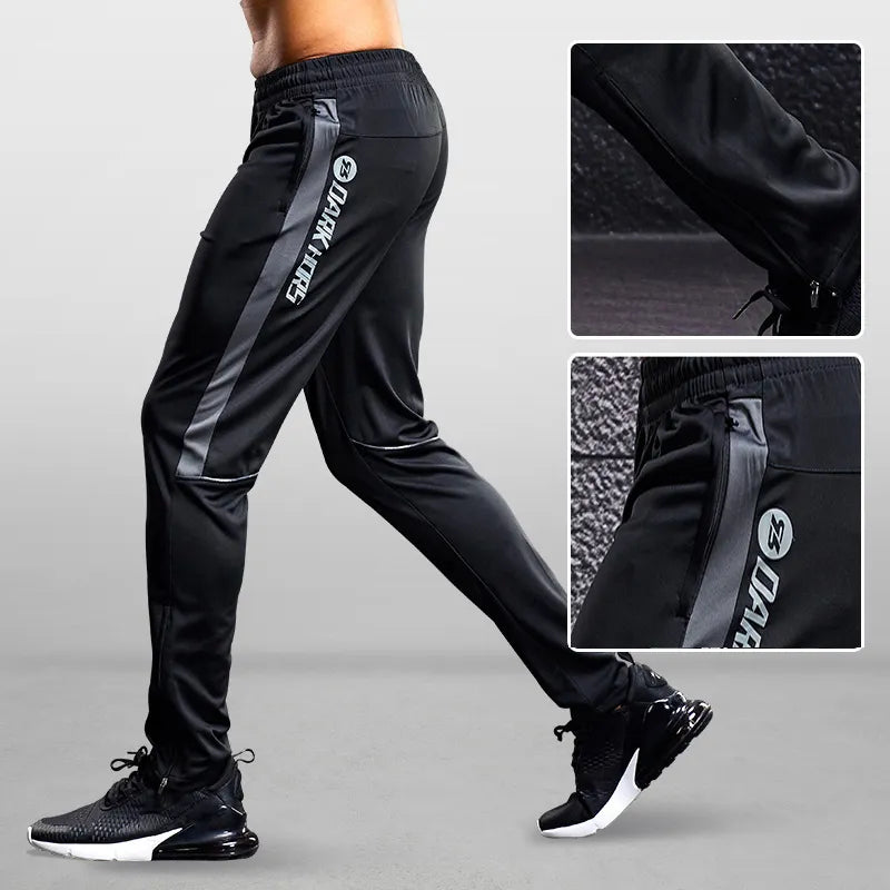 Rear view of men's black tapered joggers, showcasing the flattering athletic fit and comfortable design.