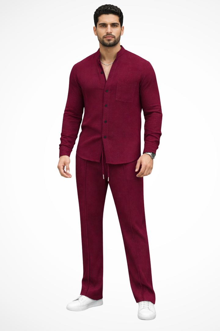 Stylish men's casual outfit. Textured button shirt & relaxed fit trousers. Complete 2-piece set.