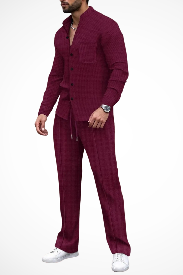 Men's relaxed fit textured button shirt and drawstring trousers set for casual wear.