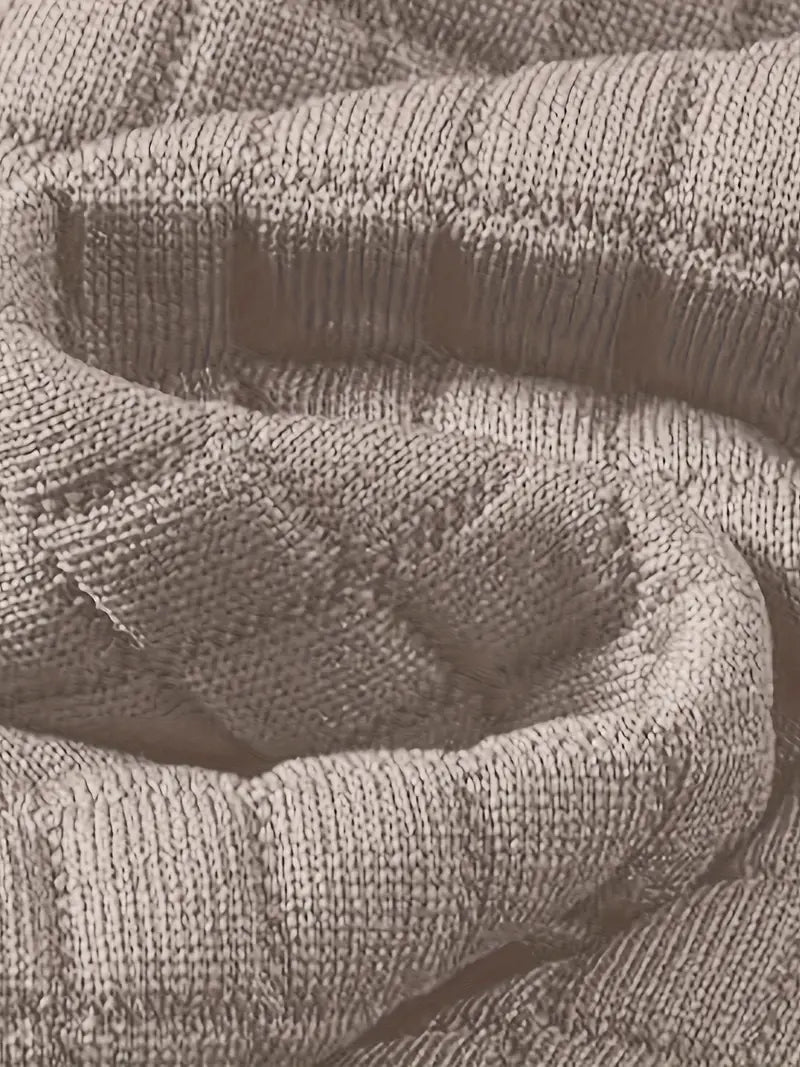 Versatile men's fashion: textured grid hooded sweatshirt paired with jeans