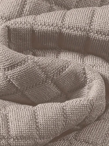 Versatile men's fashion: textured grid hooded sweatshirt paired with jeans