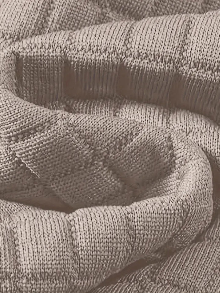 Versatile men's fashion: textured grid hooded sweatshirt paired with jeans