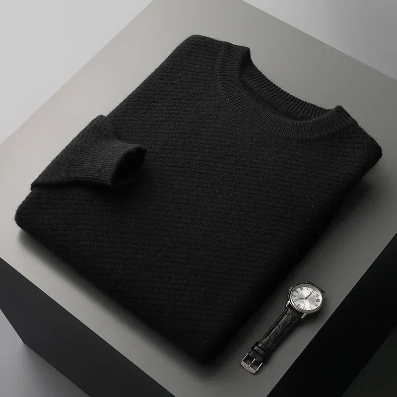 Stylish men's winter sweater, features a comfortable textured knit, crew neck, and ribbed cuffs.