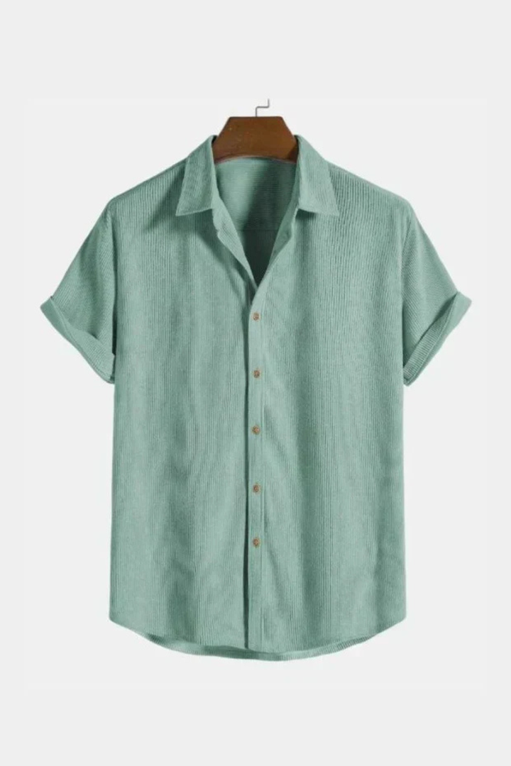 Front view of a men's casual textured short sleeve camp collar shirt, a stylish summer top.