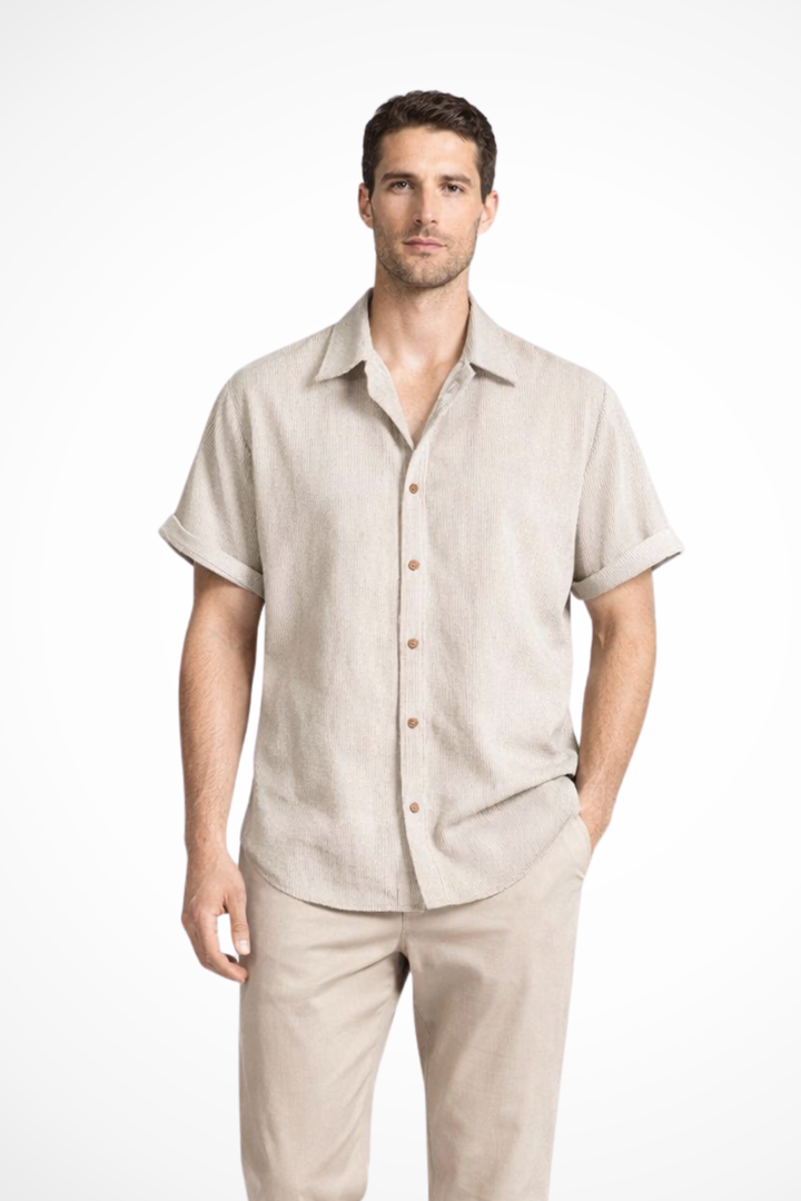 Modern men's textured short sleeve camp collar button-down for casual, warm weather style.