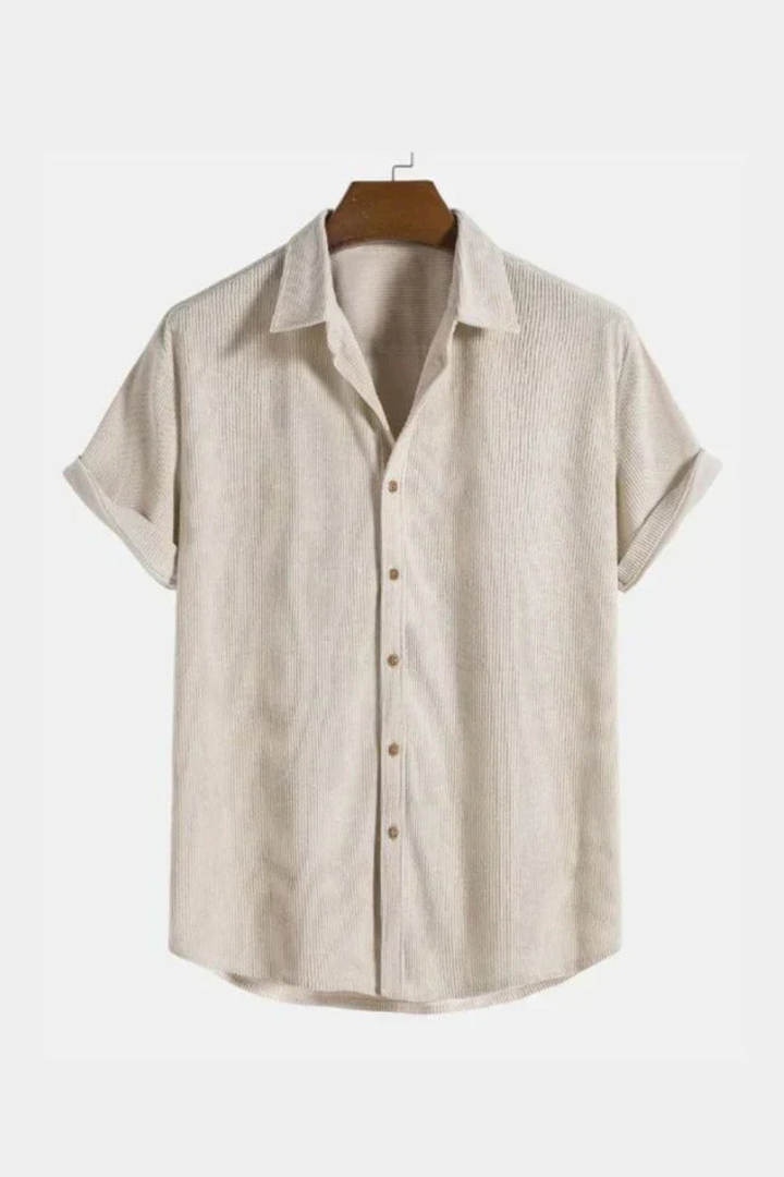 Comfortable men's textured short sleeve shirt with a camp collar, perfect for relaxed summer fashion.