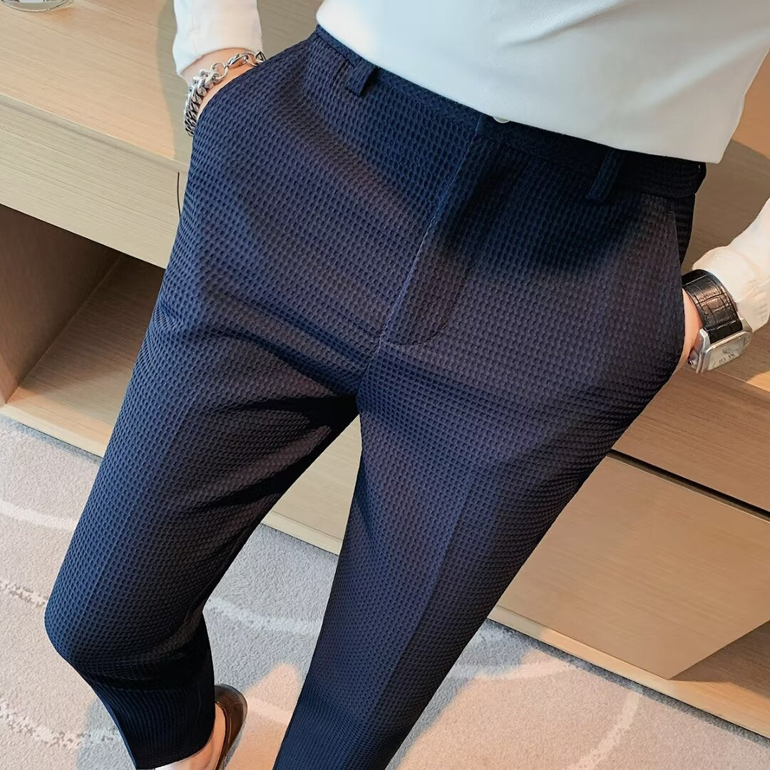Men's formal slim fit trousers with a subtle texture, ideal for business or special occasions.