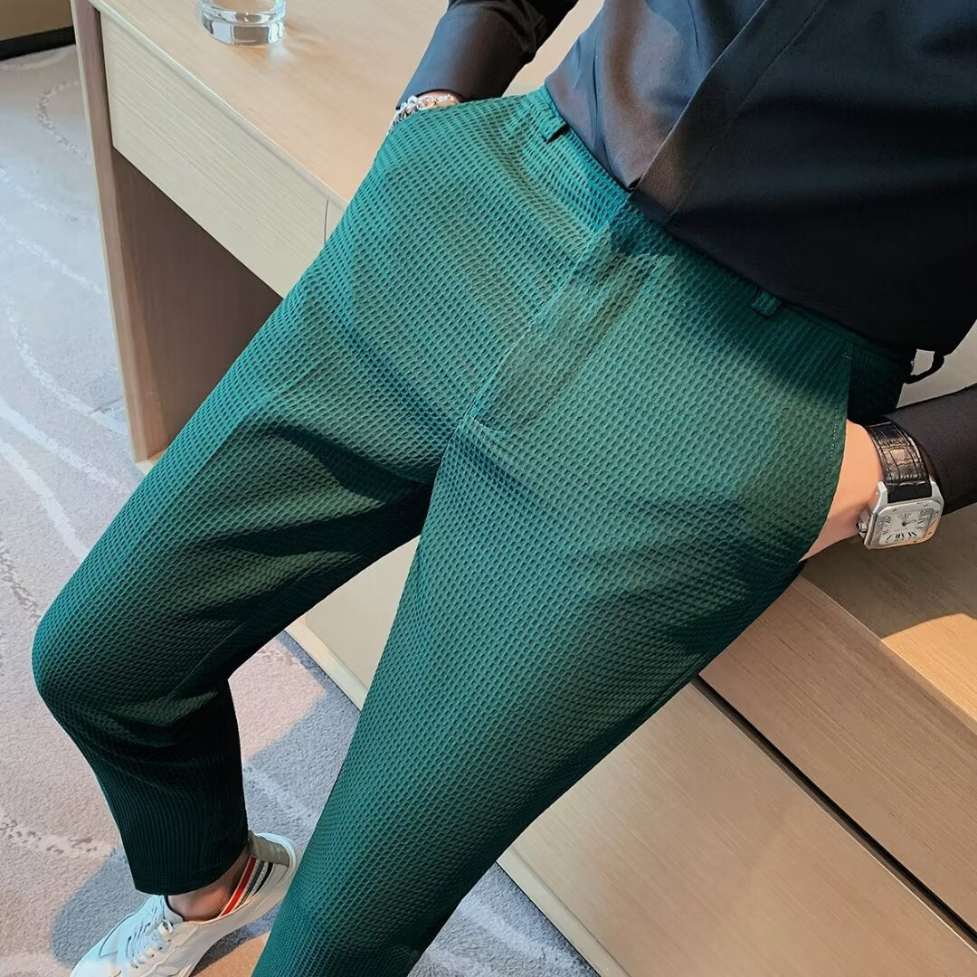 Stylish men's dress pants, slim fit and textured, offering a versatile option for various fashion styles.