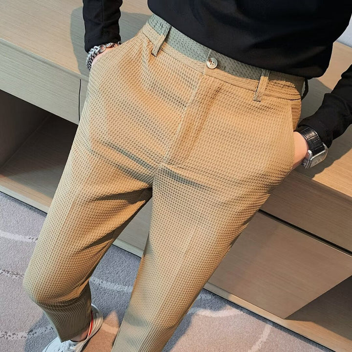 Comfortable men's textured slim fit trousers, suitable for both elegant formal wear and smart casual looks.