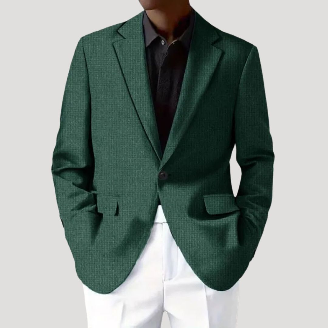Close-up of a men's woven textured blazer, highlighting the quality fabric and tailored fit.