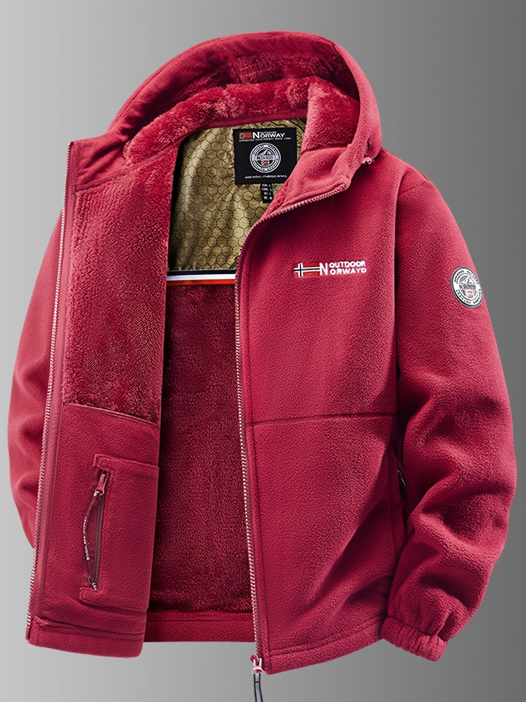 Detail of the zipper and pockets on a men's wind-resistant thermal fleece winter coat