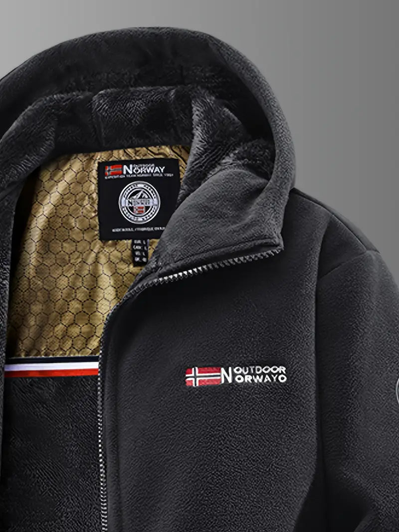 Folded men's thermal fleece-lined winter coat, compact yet warm, ready for cold weather travel
