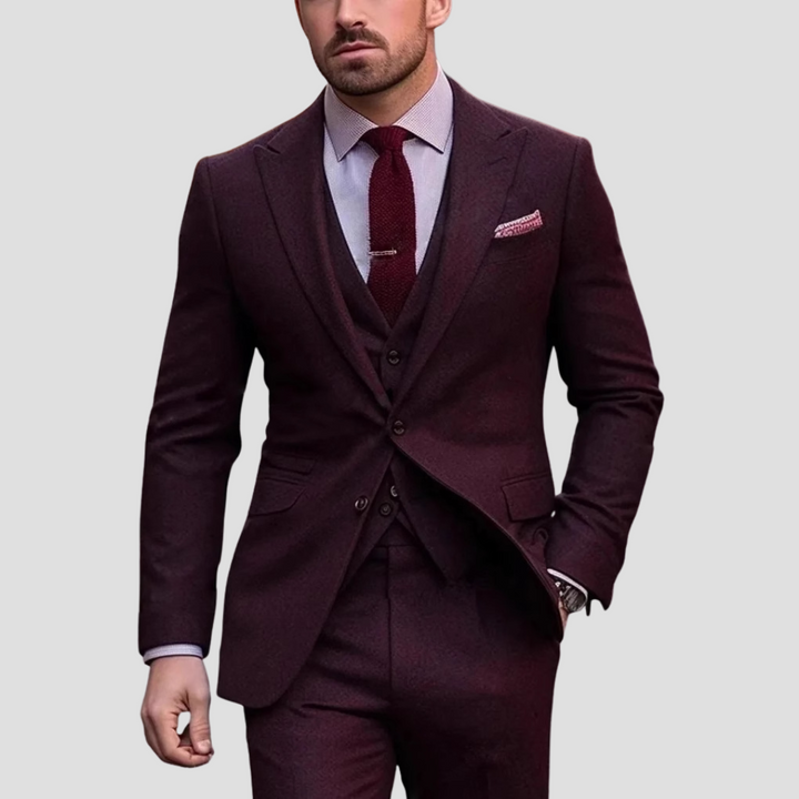 Black men's three-piece slim fit suit, tailored for formal events, business, or elegant wedding attire.