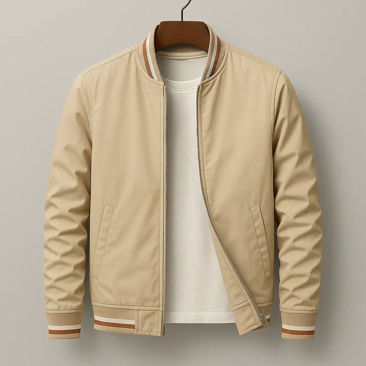 Durable men's windproof bomber jacket with ribbed cuffs. Keeps you warm and stylish for everyday wear.