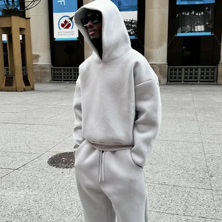 Navy blue men's comfort pullover hoodie. Relaxed fit, drawstring hood, long sleeves. Versatile for casual & sport.